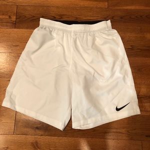 White Nike shorts